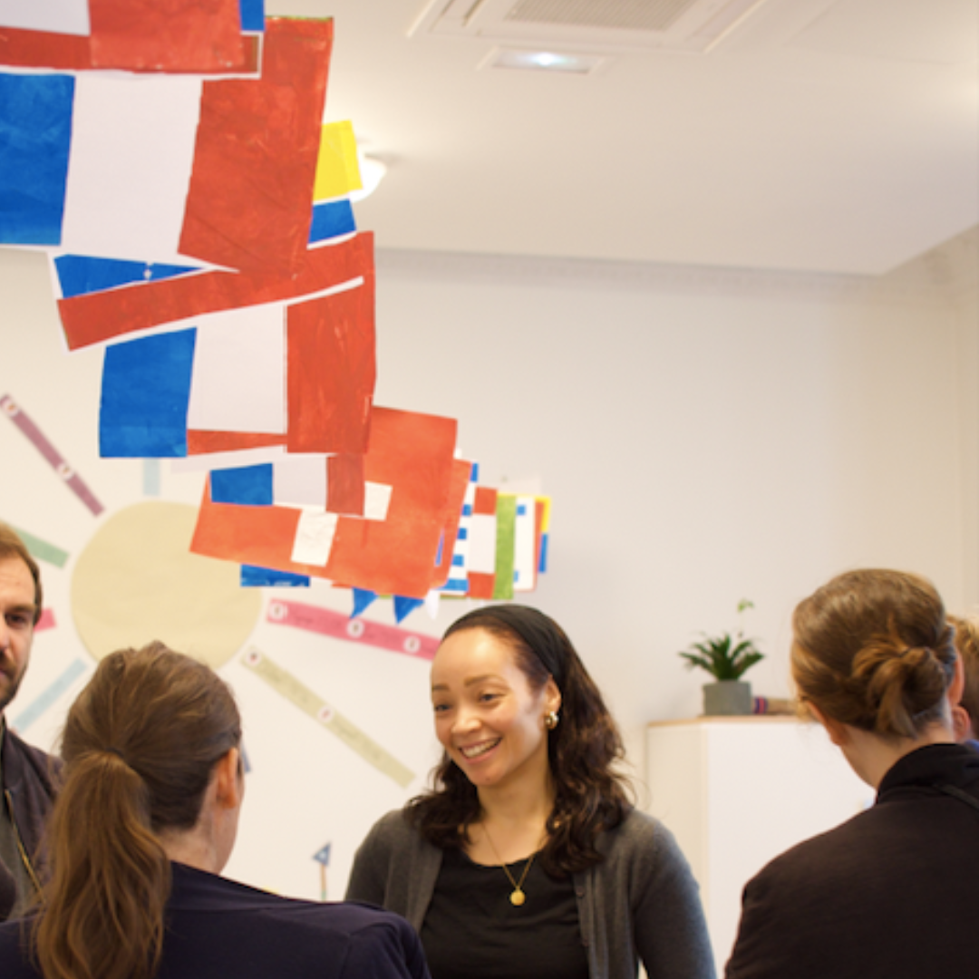 Teacher and flag on international.day at École Bilingue Chardin 